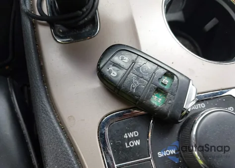 2014 Jeep Grand Cherokee Overland z USA, uszkodzony, nr VIN 1C4RJFCG6EC570431